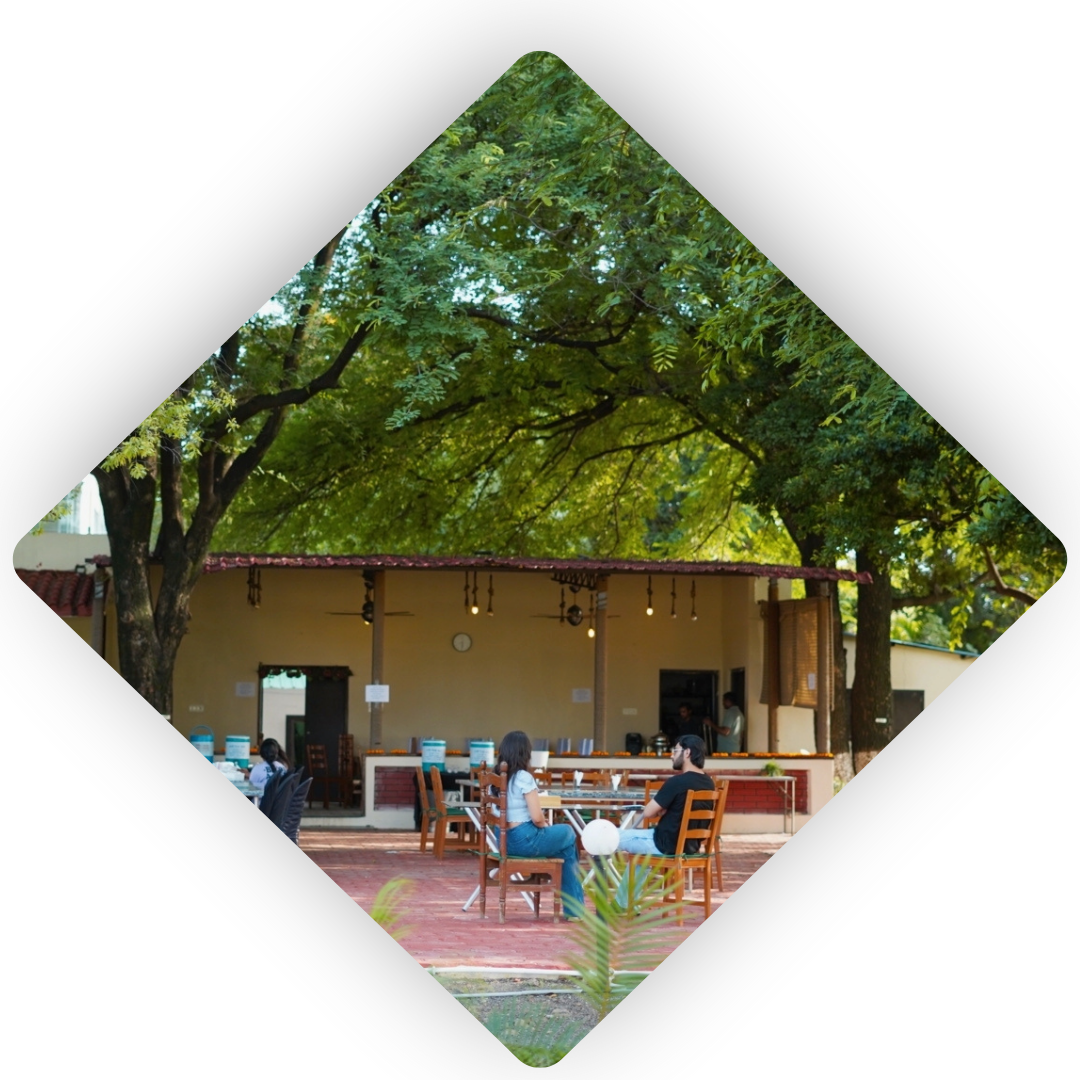 Banquet hall exterior surrounded by greenery